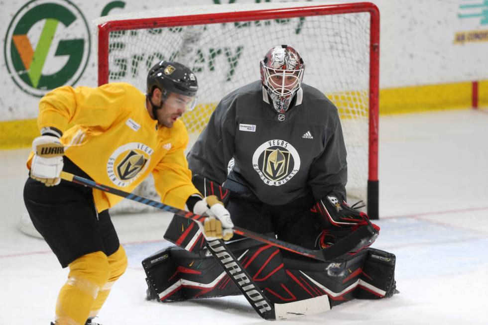 Vegas Golden Knights goaltender Robin Lehner defends a shot from William Carrier during a team ...