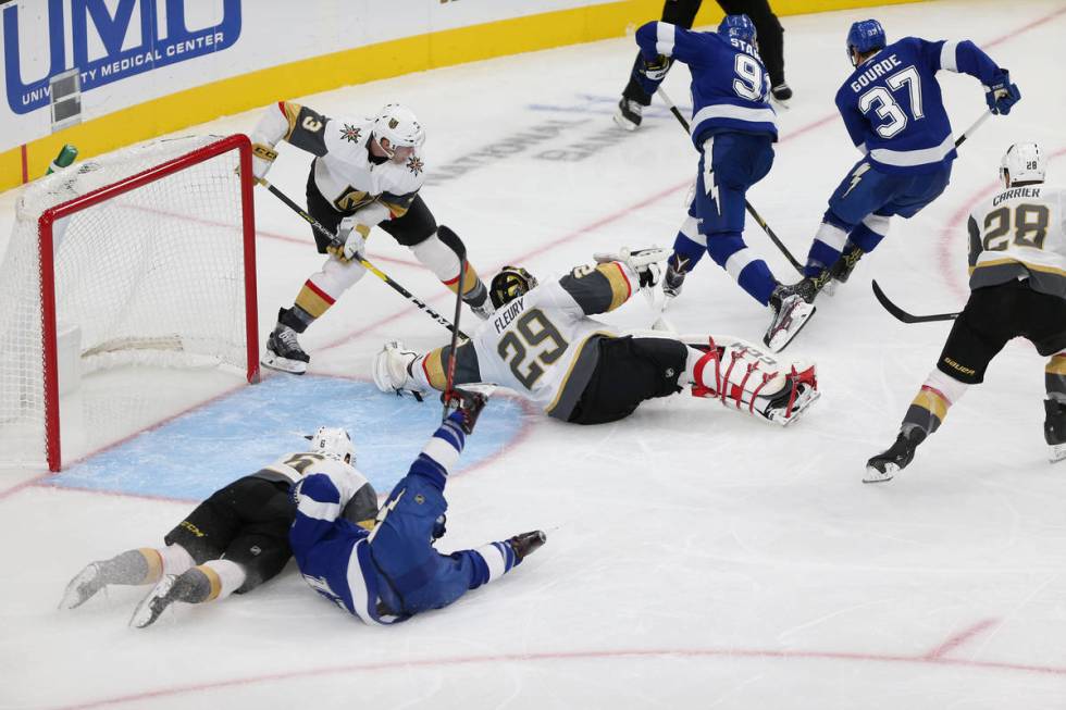 Vegas Golden Knights goaltender Marc-Andre Fleury (29) defends a shot against Tampa Bay Lightni ...