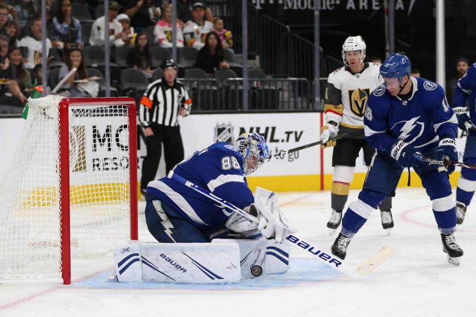 Tampa Bay Lightning goaltender Andrei Vasilevskiy (88) makes a stop against Vegas Golden Knight ...