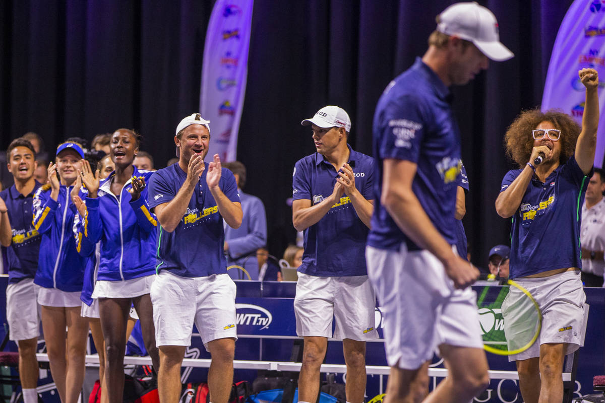 Vegas Rollers' teammates congratulate Sam Querrey as he closes the gap in score during his men' ...