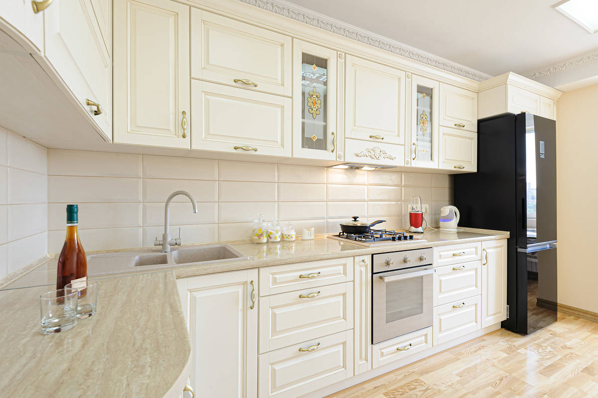 Stained-glass cabinet panels bring color to this modern kitchen. (Getty Images)