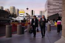 Visitors leave CES on the final evening of the convention at the Las Vegas Convention Center in ...