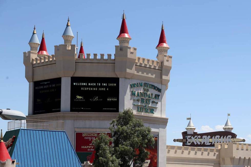 A digital sign at Excalibur announces the reopening of some MGM Resorts International casinos o ...