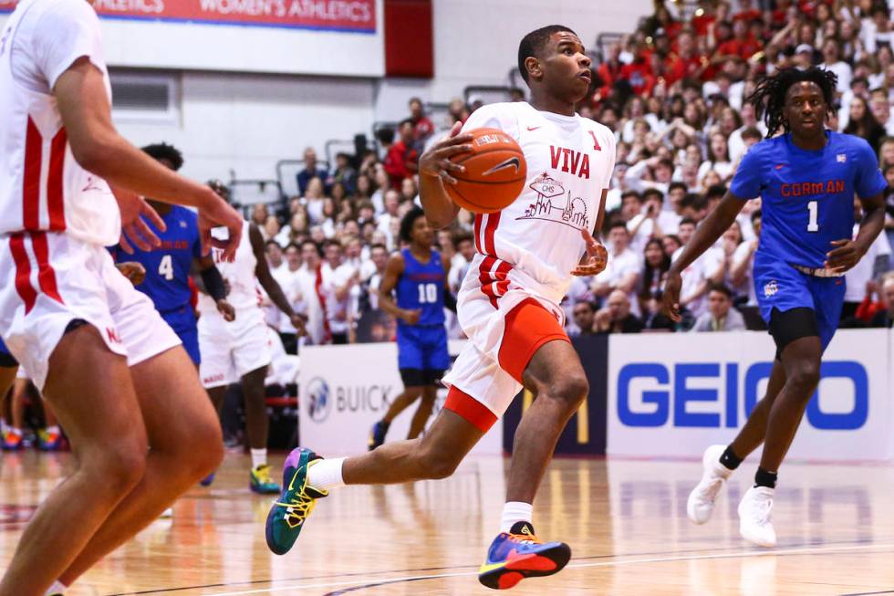 Coronado's Jaden Hardy (1) drives to the basket against Bishop Gorman's Will McClendon (1) duri ...