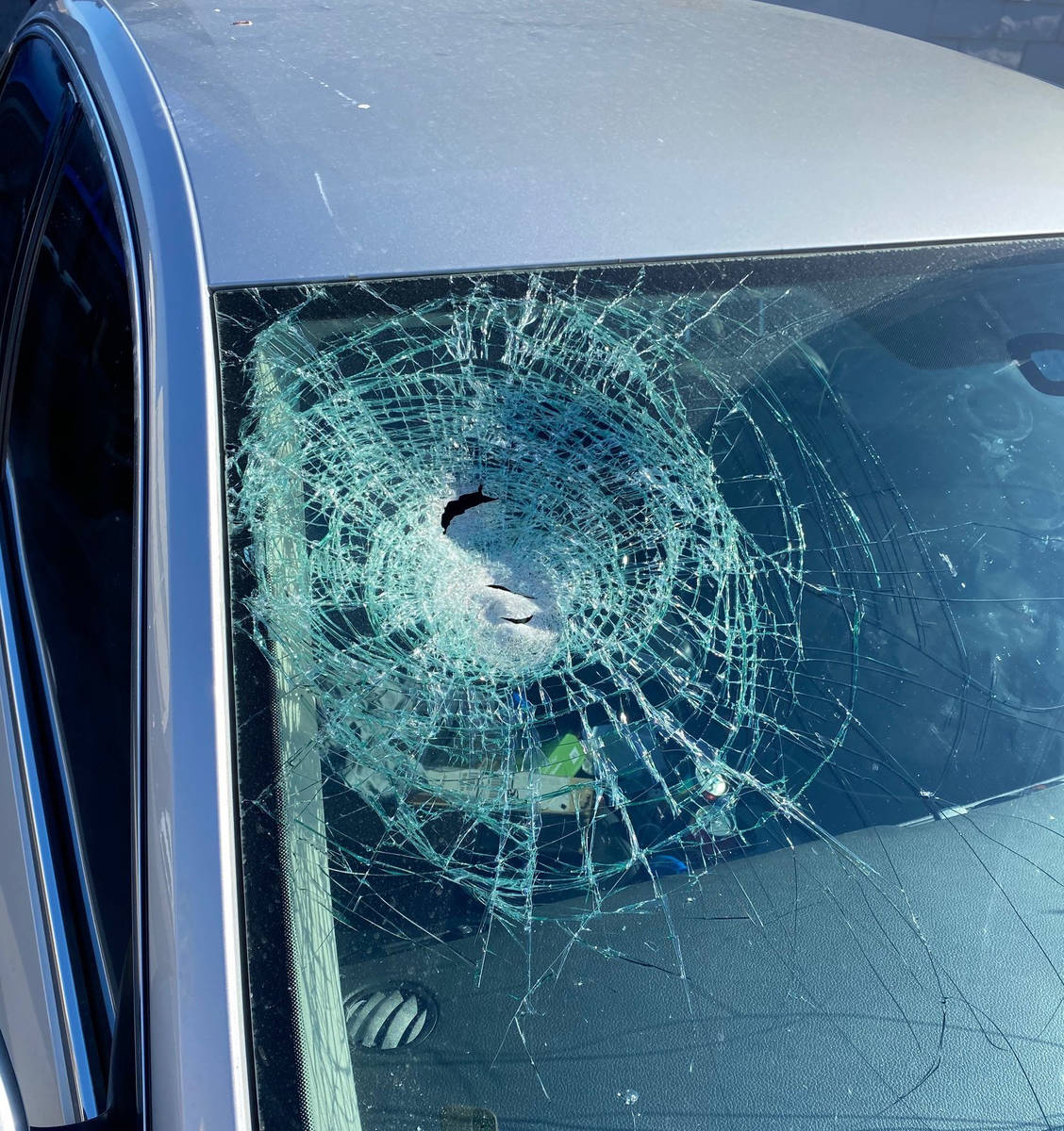 This is one of 25 vehicles damaged when rocks were thrown from an overpass on U.S. Highway 95 i ...