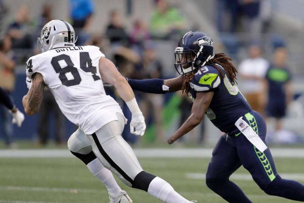 Seattle Seahawks linebacker Shaquem Griffin (49) pursues Oakland Raiders tight end Paul Butler ...