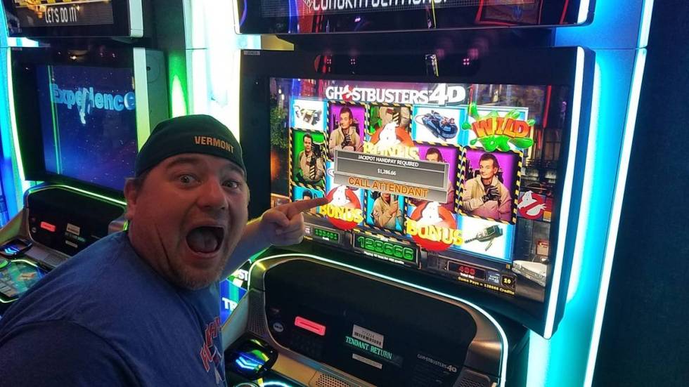 Rob Tetlow poses next to a jackpot win at Mandalay Bay in March, 2019. (Courtesy)