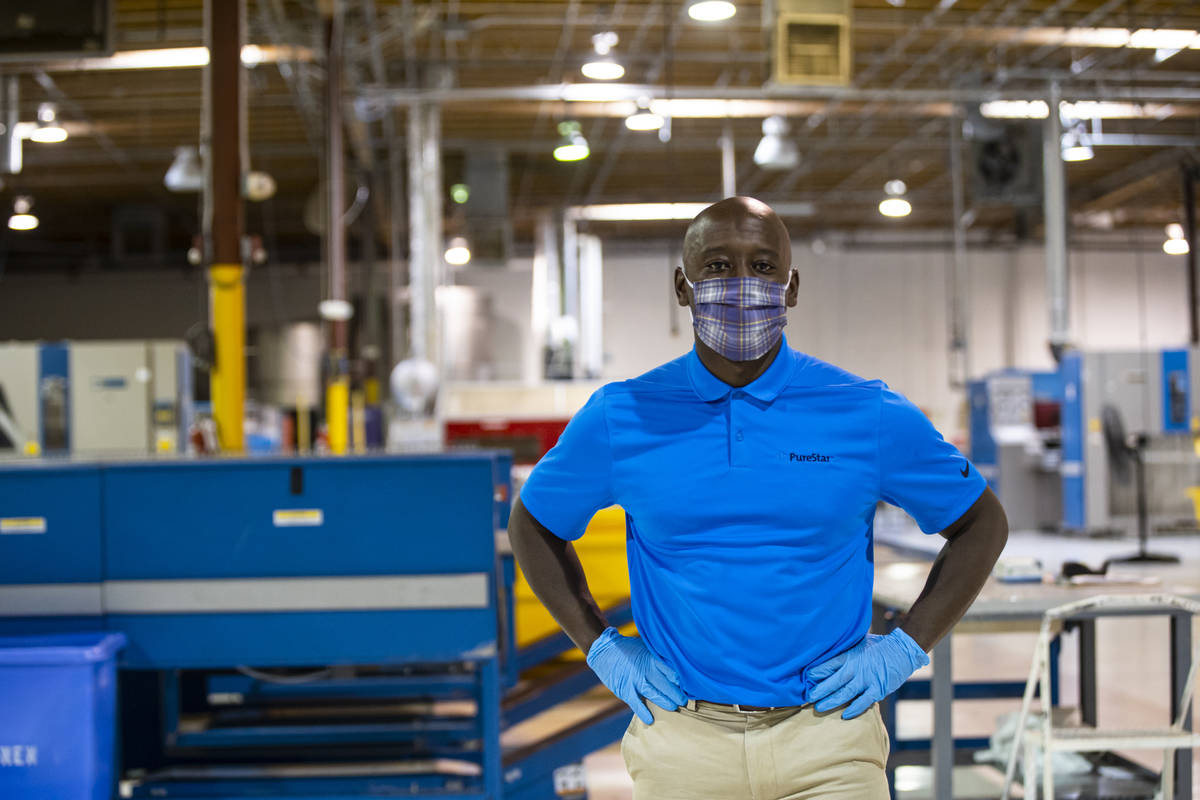 Alex Dixon, west region president of PureStar, poses for a portrait at the Western Linen Servic ...