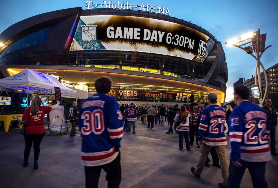 In this Jan. 7, 2018, file photo, New York Rangers fans arrive at T-Mobile Arena for an NHL hoc ...