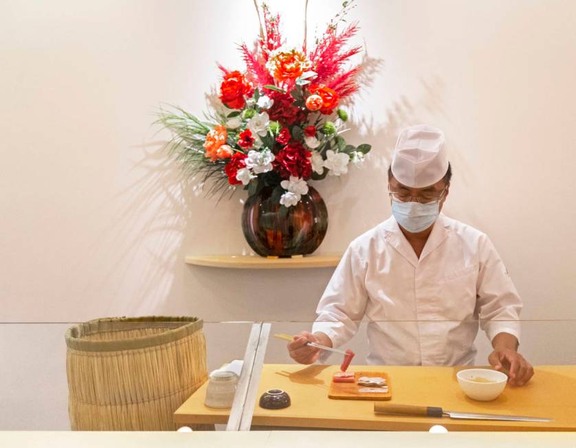 Executive chef Kaz Iida prepares sushi at Yui Edomae Sushi on Thursday, May 28, 2020, in Las Ve ...