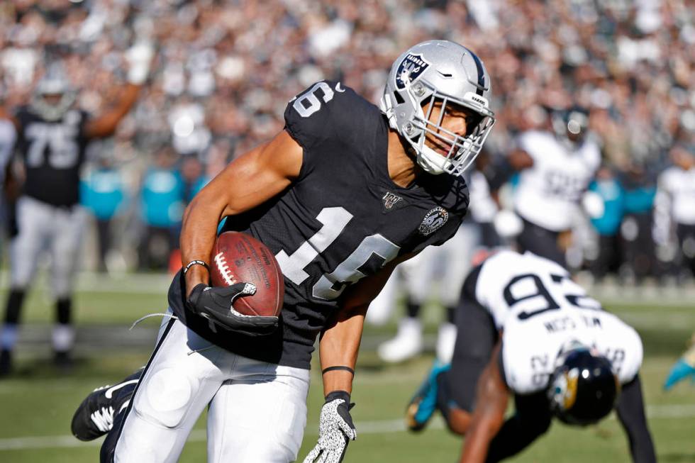 Oakland Raiders wide receiver Tyrell Williams runs with the ball for a touchdown past Jacksonvi ...