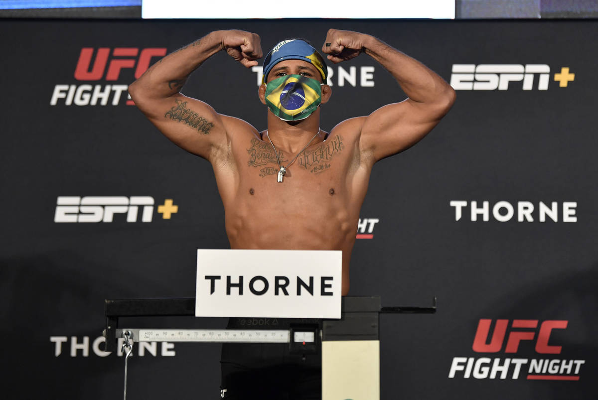 Gilbert Burns of Brazil poses on the scale during the UFC weigh-in at UFC APEX on May 29, 2020 ...