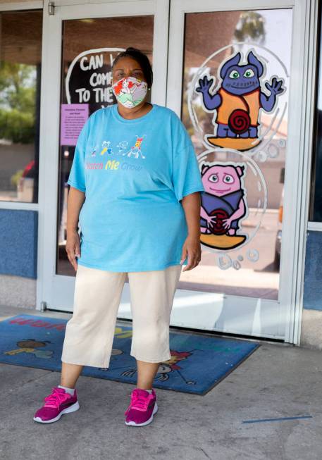 Kim Morgan-Smith stands in front of Watch Me Grow, the day care center where she works, on Frid ...