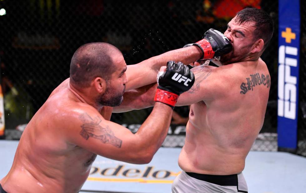 LAS VEGAS, NEVADA - MAY 30: (L-R) Blagoy Ivanov of Bulgaria punches Augusto Sakai of Brazil in ...