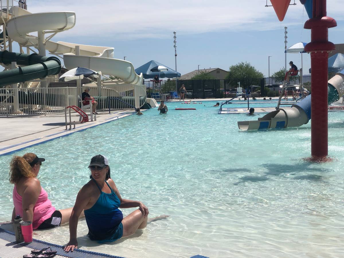 Darcy Dozier, left and Amy Aguilar, right, at the reopening of the Whitney Ranch Activity Pool ...