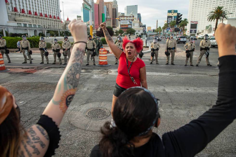 Makkah Fields pumps up the crowd during a Black Lives Matter protest along the Las Vegas Strip ...