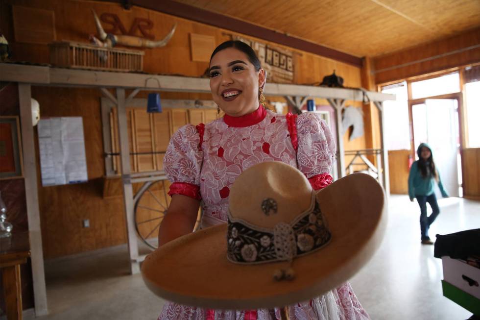 Vanessa Jauregui, 24, shows off her sombrero while preparing for a performance in February. (Er ...