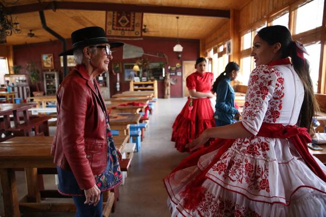 Alondra Colon, 23, right, talks to Marilyn Gubler, owner and founder of Sandy Valley Ranch, whi ...
