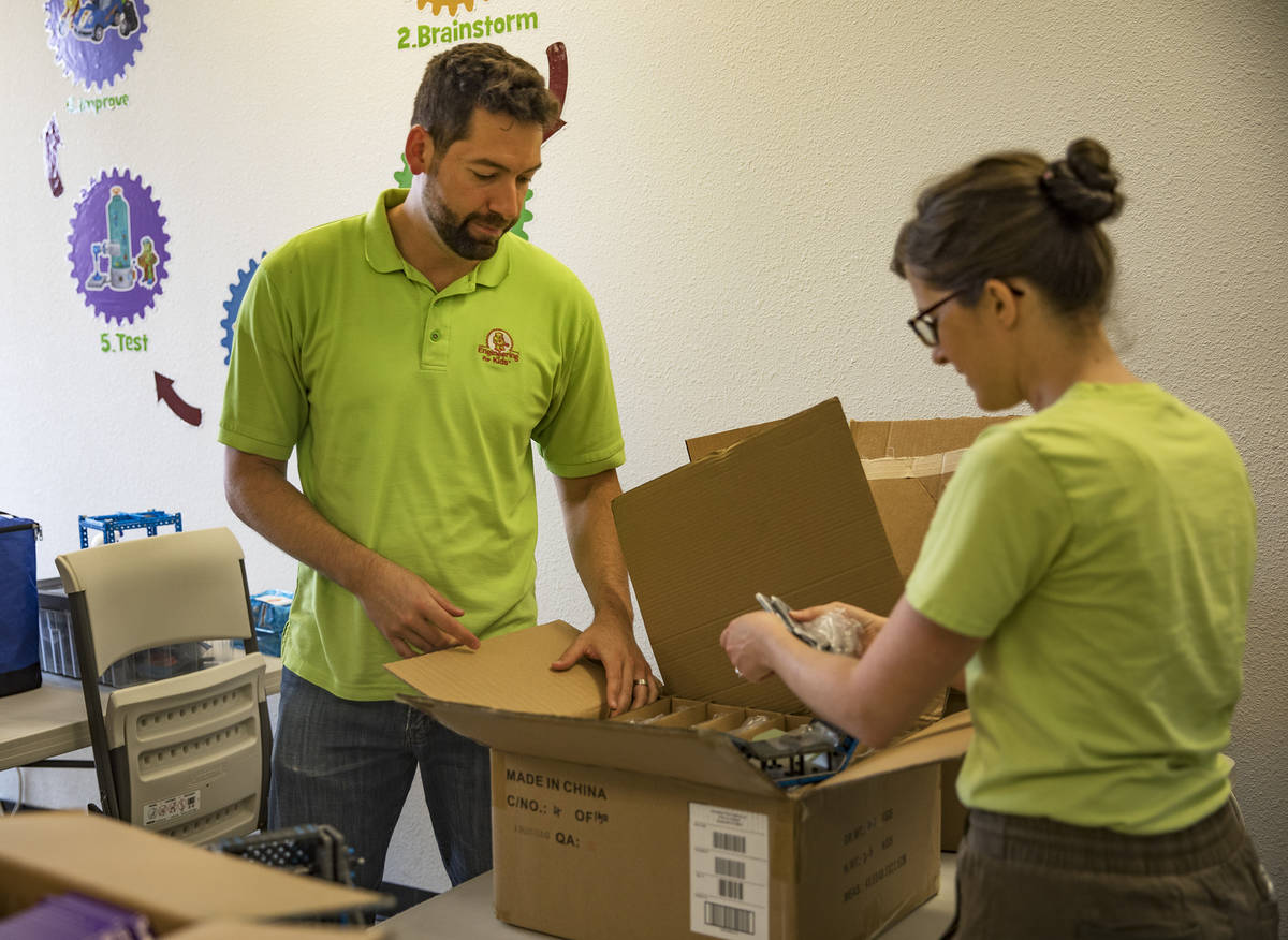 Leo Silva, left, co-owner and teacher, and his wife Elise Silva, right, co-owner and teacher, s ...