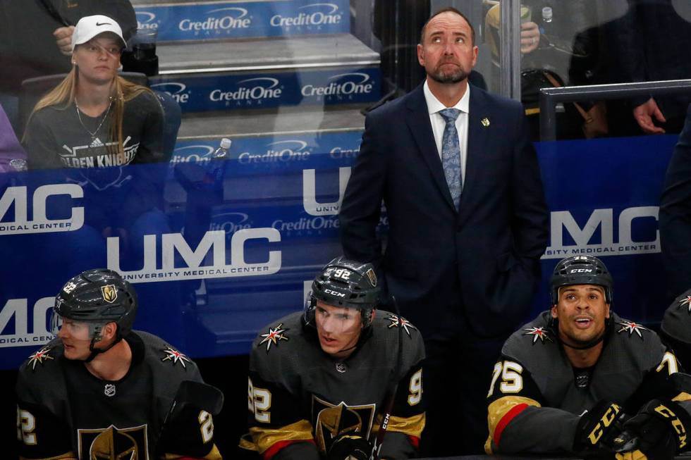 Vegas Golden Knights head coach Pete DeBoer looks up at the display board in the second period ...