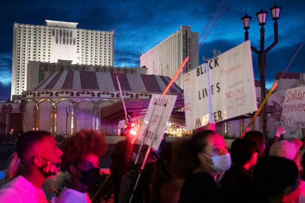 Protestors make way down Las Vegas Boulevard past Circus Circus in support of George Floyd, who ...