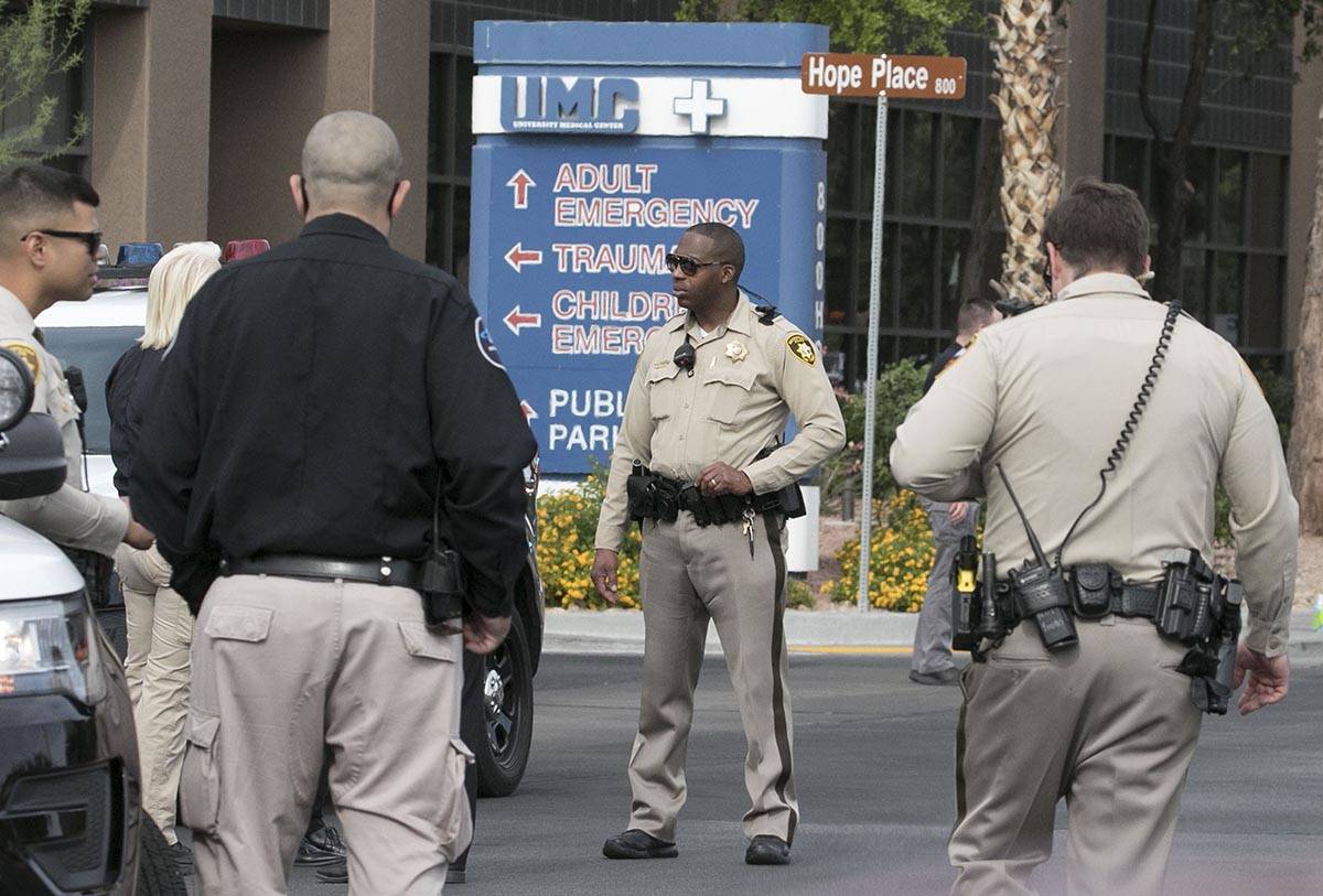 Las Vegas police officers gather outside University Medical Center on Tuesday, June 2, 2020. A ...