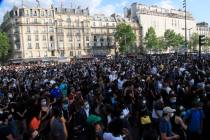 Protesters gather Tuesday, June 2, 2020 in Paris. Thousands of people defied a police ban and c ...