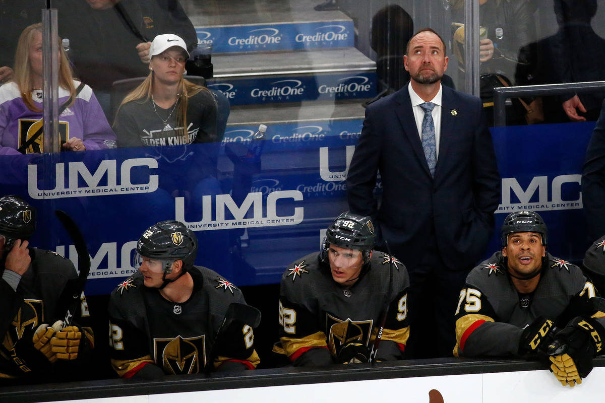 Vegas Golden Knights head coach Pete DeBoer looks up at the display board in the second period ...