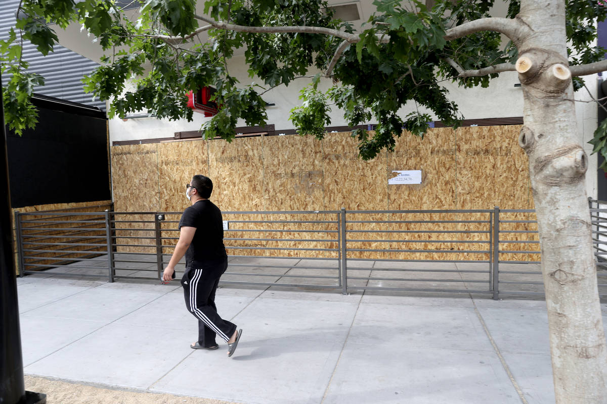 Therapy, which had reopened after the coronavirus shutdowns, is boarded up on East Fremont Stre ...