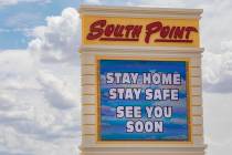 A South Point electronic marquee sign sends a message to stay home, at South Point in Las Vegas ...