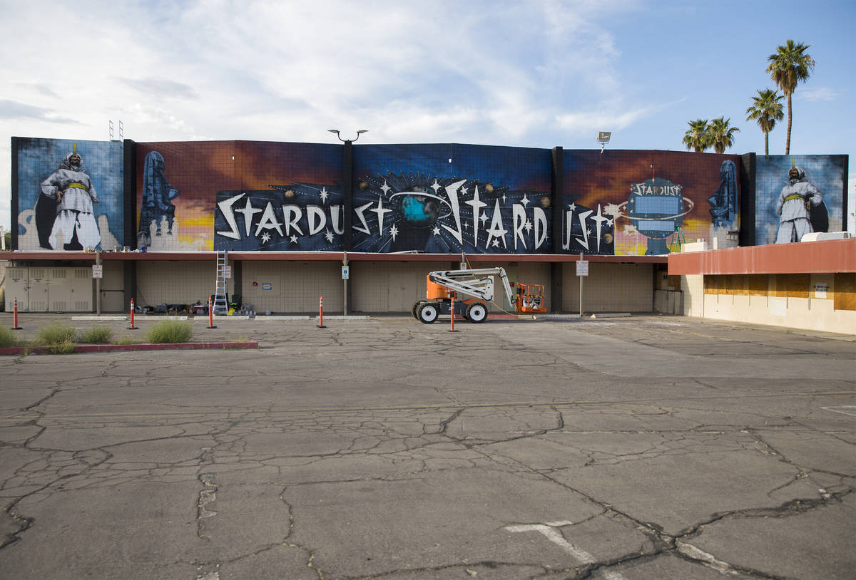 The new mural in progress, “From the Land Beyond Beyond,” by artist James Stanfor ...