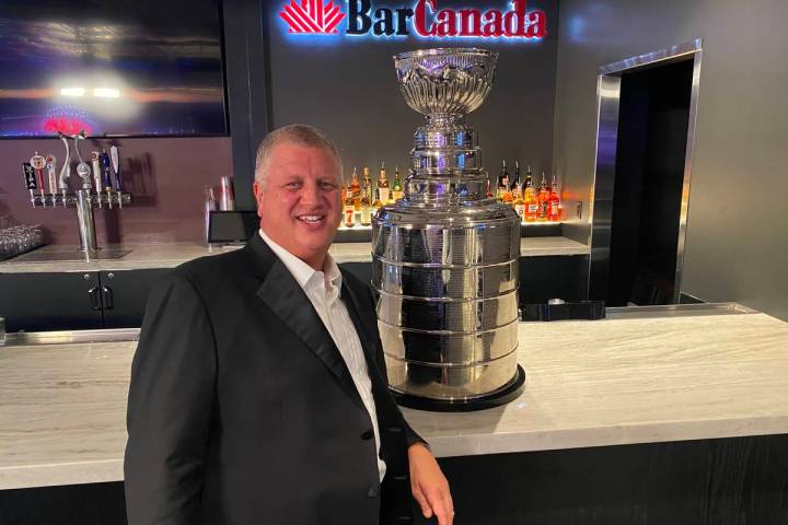 The D Las Vegas co-owner Derek Stevens poses with a replica Stanley Cup at BarCanada on Wednesd ...