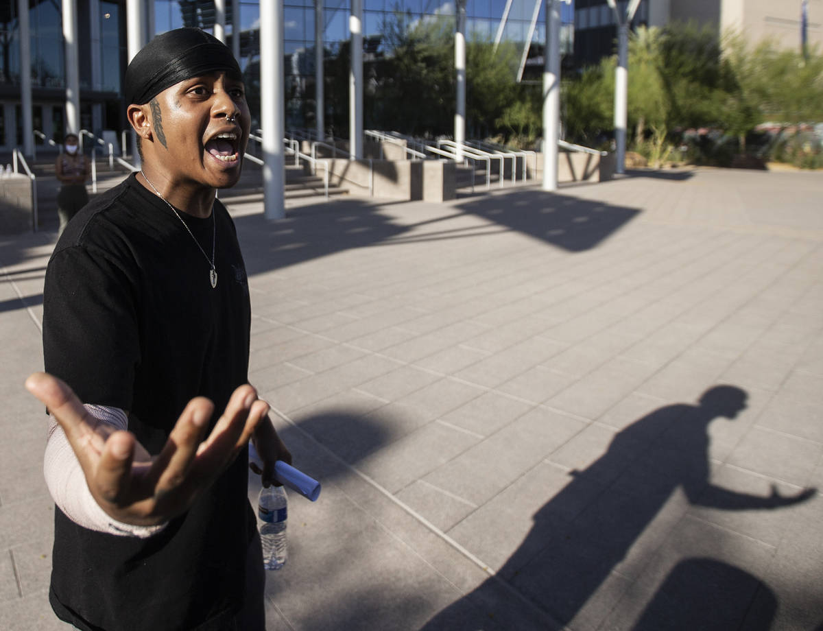 Prie Falaniko pleads for calm at a protest outside Las Vegas City Hall on Wednesday, June 3, 20 ...
