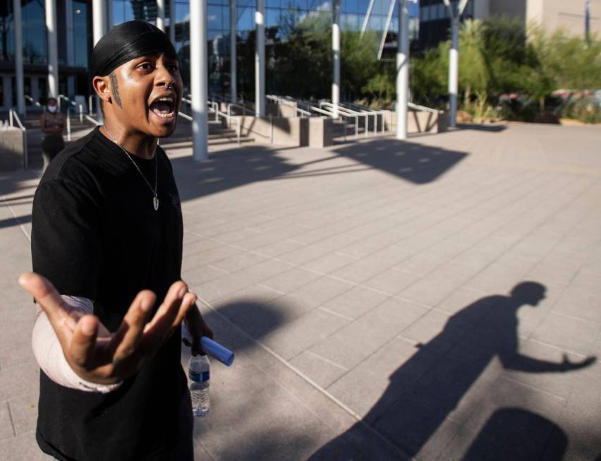 Prie Falaniko pleads for calm at a protest outside Las Vegas City Hall on Wednesday, June 3, 20 ...