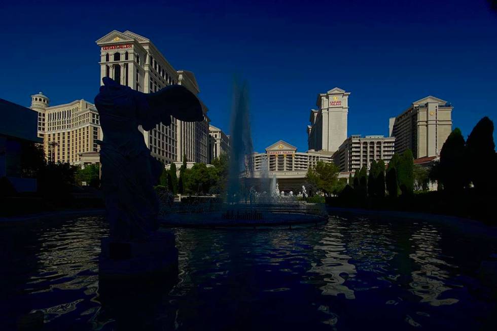 Shortly before the opening ceremonies the fountains welcome visitors to Caesars Palace on Thurs ...