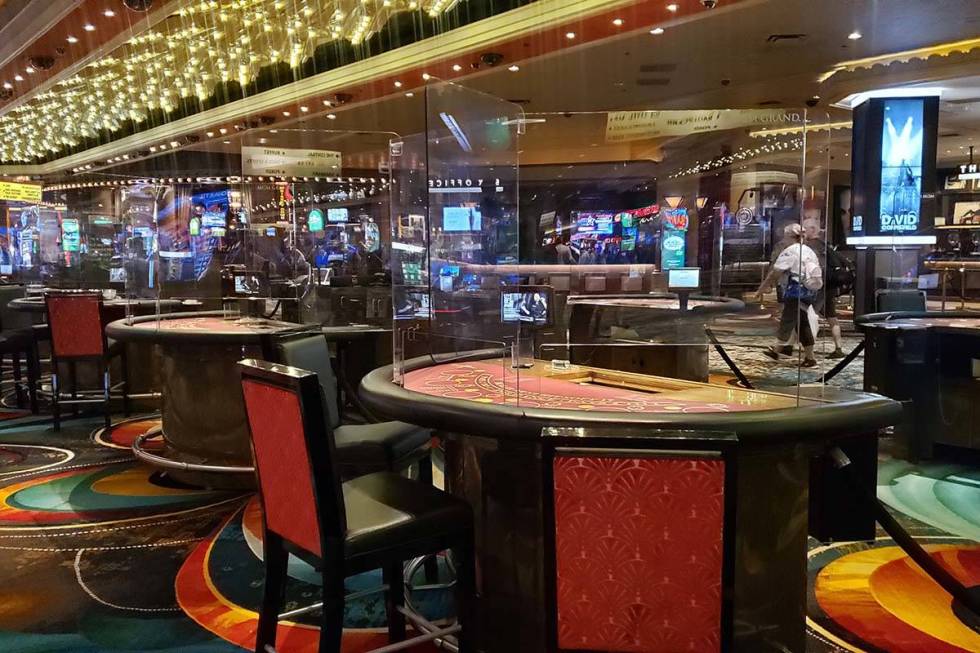 Glass partitions at gaming tables at the MGM Grand on Thursday, June 4, 2020. (Aleksandra Apple ...