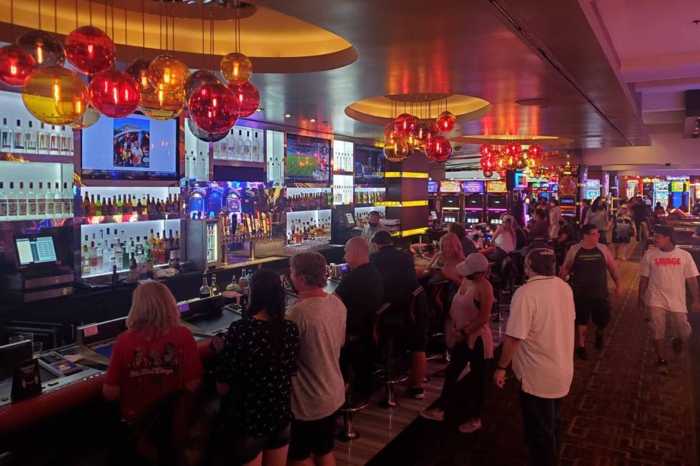 Visitors walk inside the Golden Nugget in downtown Las Vegas early Thursday, June 4, 2020. (Cha ...