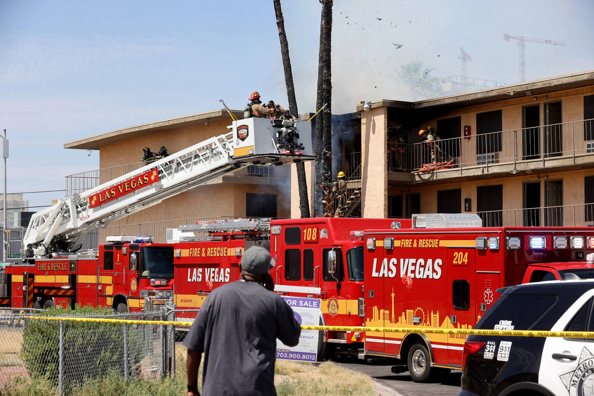 Las Vegas and Clark County firefighters battle a fire at Siegel Suites at 700 Las Vegas Blvd. N ...