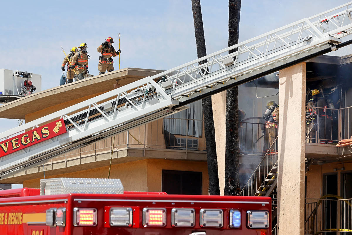 Las Vegas and Clark County firefighters battle a fire at Siegel Suites at 700 Las Vegas Blvd. N ...