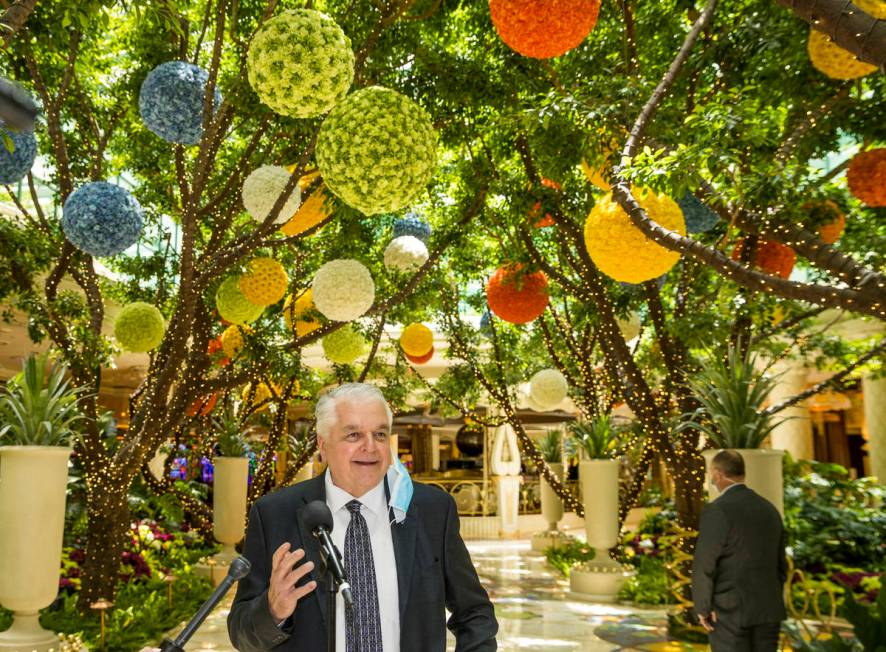 Gov. Steve Sisolak answers a few questions during a tour at the Wynn Las Vegas to view their co ...