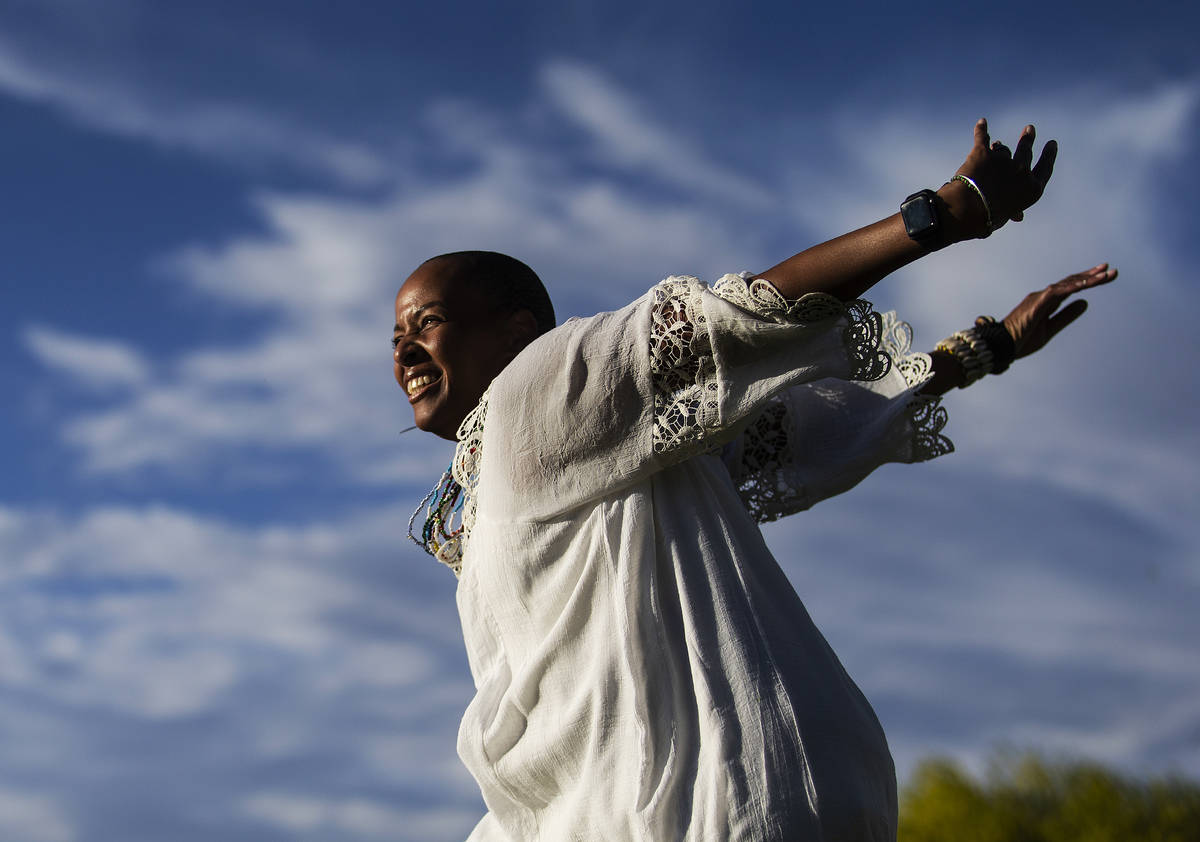 Nicole Palacio dances during at a Black Lives Matter event at Kianga Isoke Palacio Park on Frid ...