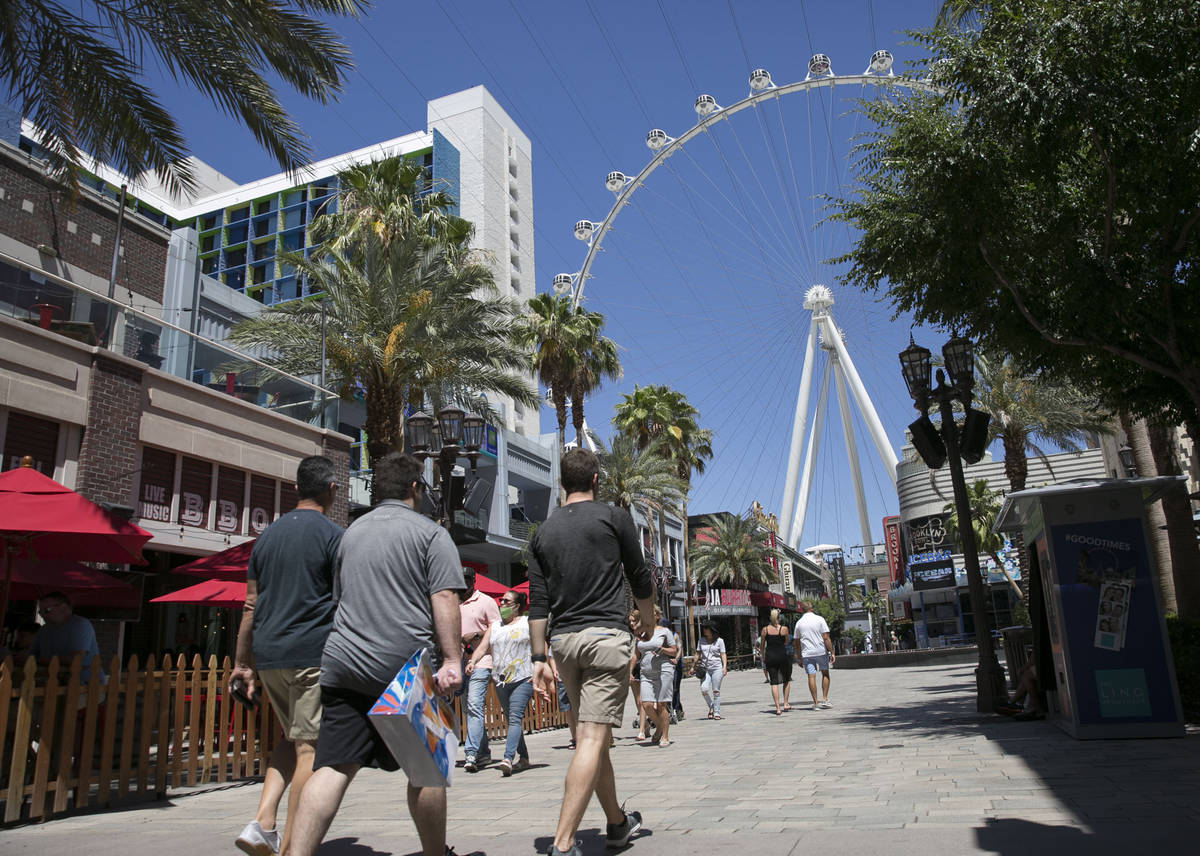 Tourists walk at The Linq Promenade on Sunday, June 7, 2020, in Las Vegas.(Bizuayehu Tesfaye/La ...