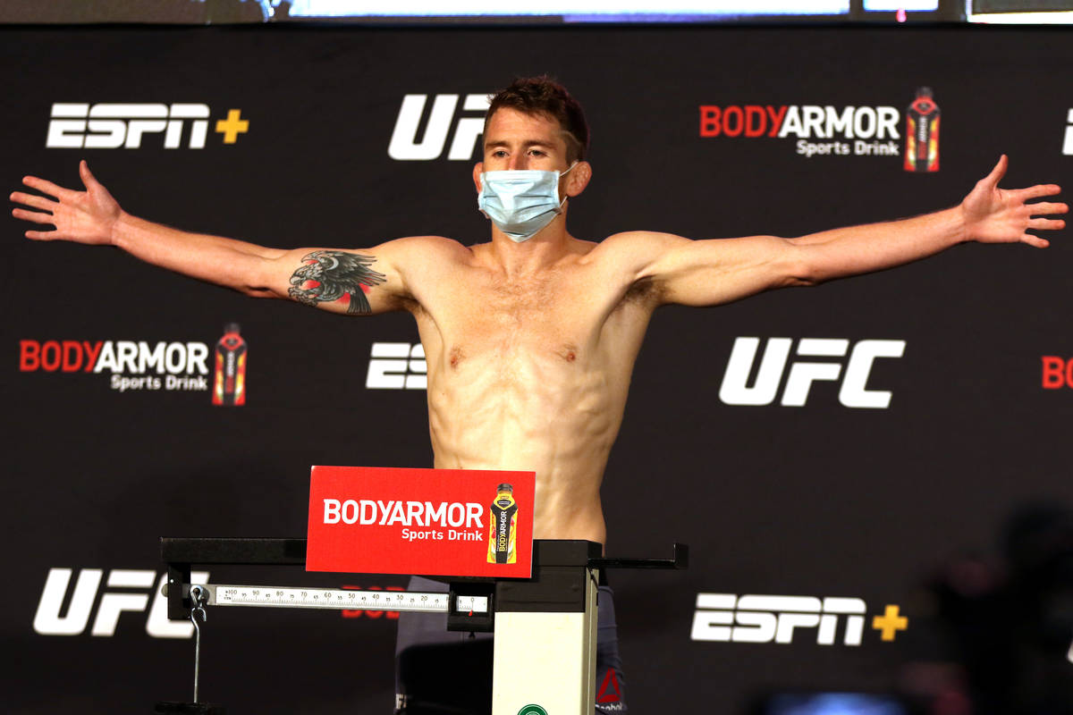 UFC bantamweight Cory Sandhagen poses on the scale at the UFC Apex after making weight for UFC ...
