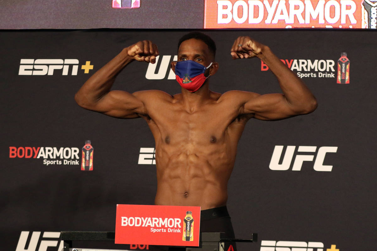 UFC welterweight Neil Magny poses on the scale at the UFC Apex after making weight for UFC 250 ...
