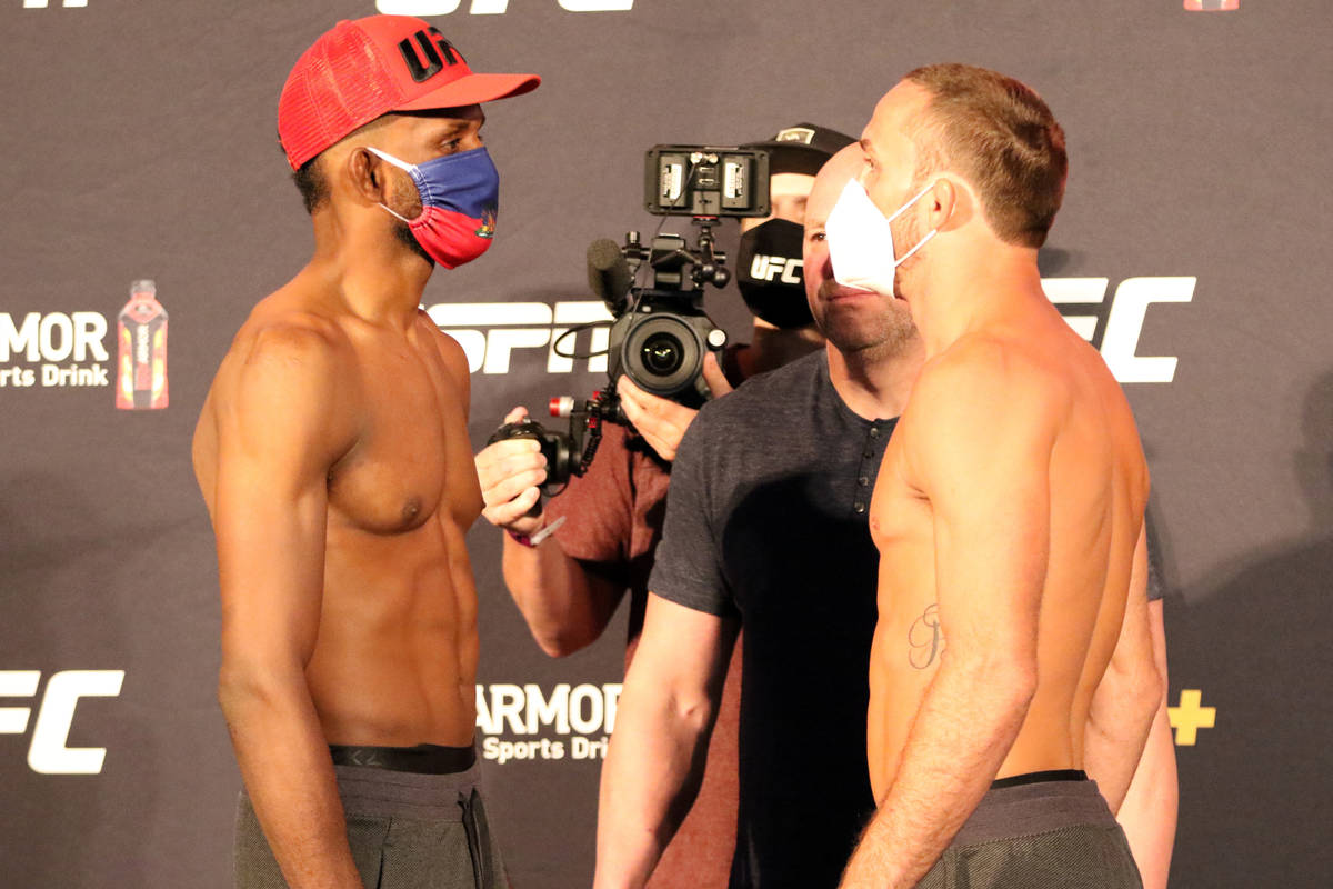 Neil Magny, left, and Anthony Rocco Martin, right, engage in a staredown at the UFC Apex after ...