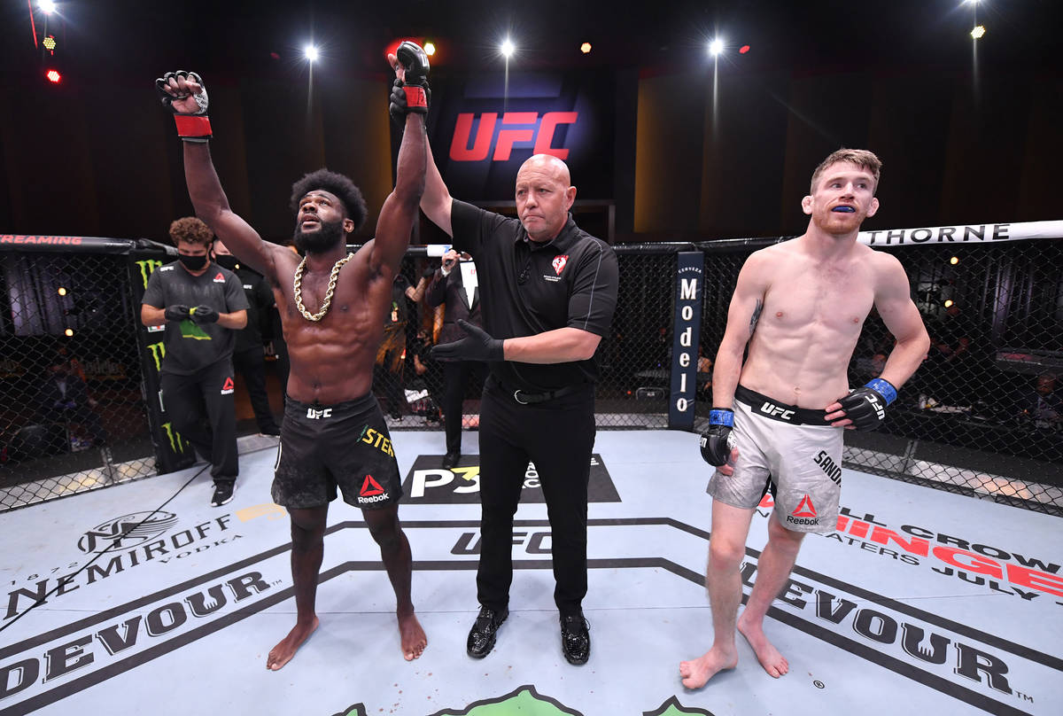 LAS VEGAS, NEVADA - JUNE 06: Aljamain Sterling celebrates after his submission victory over Cor ...
