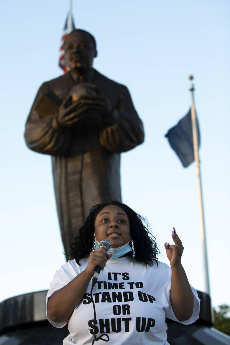 Jada Stinnett speaks to a group outside the Martin Luther King Jr. Senior Center about the impo ...