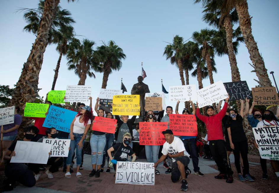 A small group of people came together for a prayer night outside the Martin Luther King Jr. Sen ...