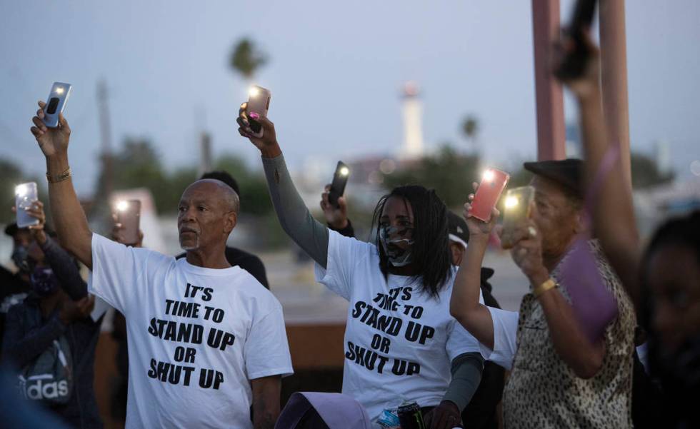 A moment of silence for George Floyd and all black lives lost to police brutality was held outs ...