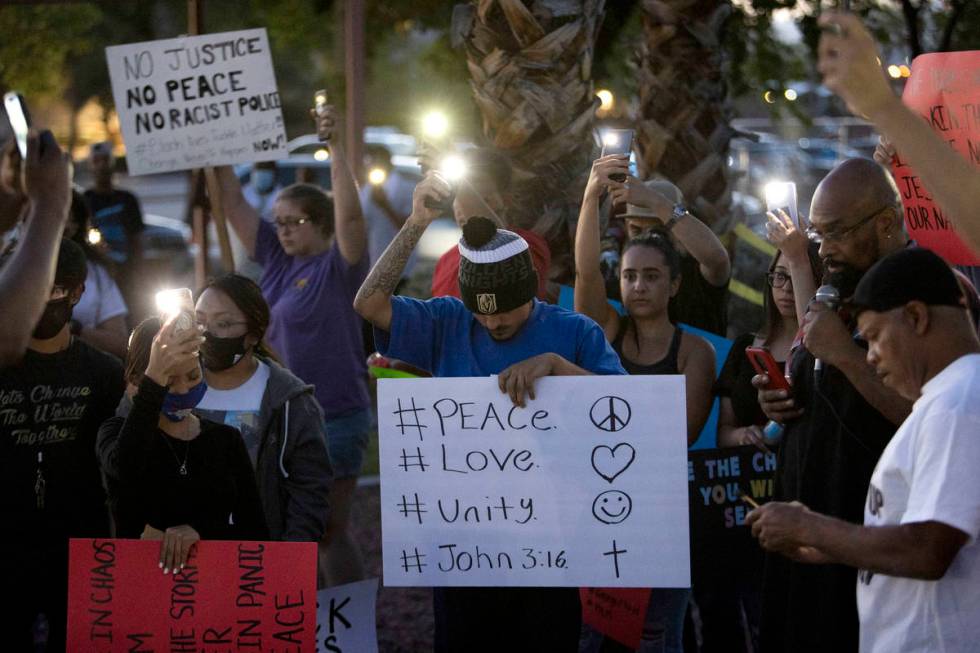 A small group of people came together for a prayer night and a moment of silence outside the Ma ...